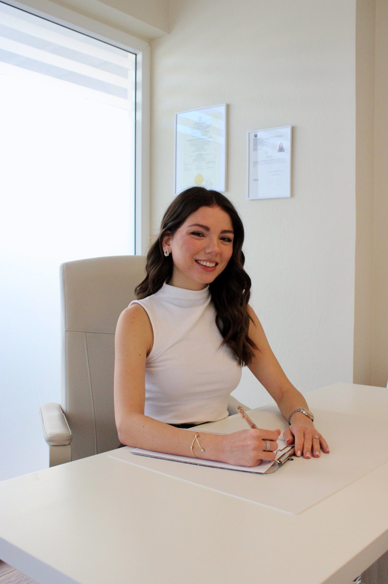 Elissavet sitting at her desk